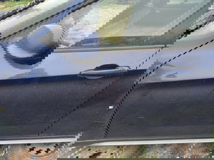 Usa stanga fata BMW X1 2.0 D OEM 2009-2015 