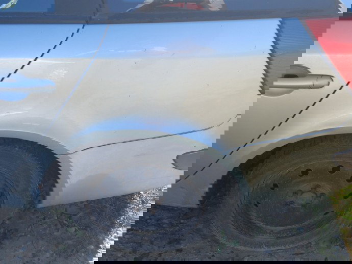 Aripa stanga spate Renault Laguna 2 1.9 DCI OEM 2001-2007