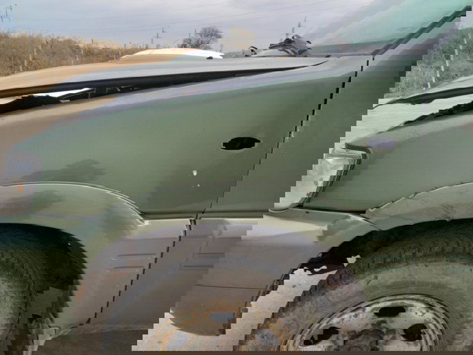 Aripa stanga fata Nissan Terrano  OEM 1999-2002