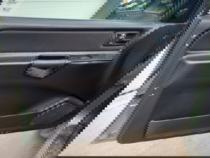 Tapiterie usa stanga fata Nissan Terrano  OEM 1999-2002