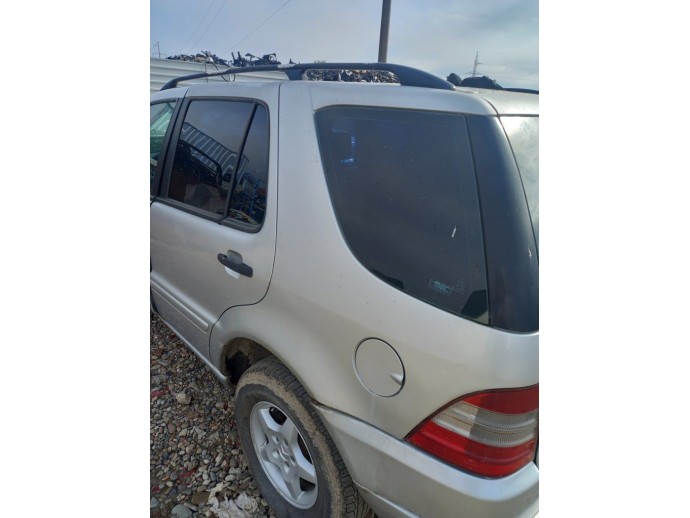 Aripa stanga spate Mercedes ML W163 2.7 CDI OEM 1998-2005
