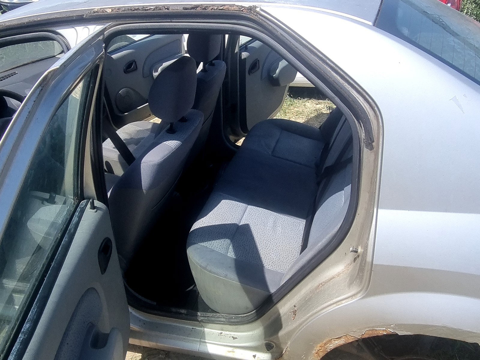 Cheder usa stanga spate Dacia Logan (LS) [Fabr 2004-2012] 1.6 B K7M-F7 64KW / 87CP