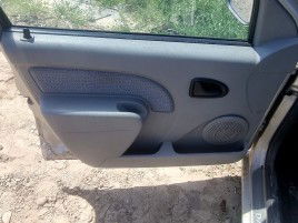 Tapiterie usa stanga fata Dacia Logan (LS) [Fabr 2004-2012] 1.6 B K7M-F7 64KW / 87CP