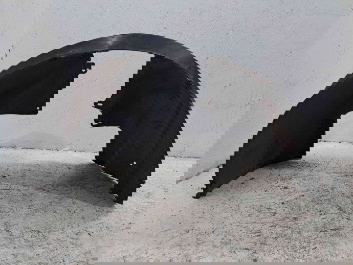 Carenaj roata stanga fata Ford Transit Connect (TC7) [Fabr 2002-2013] 2T14 16115 A