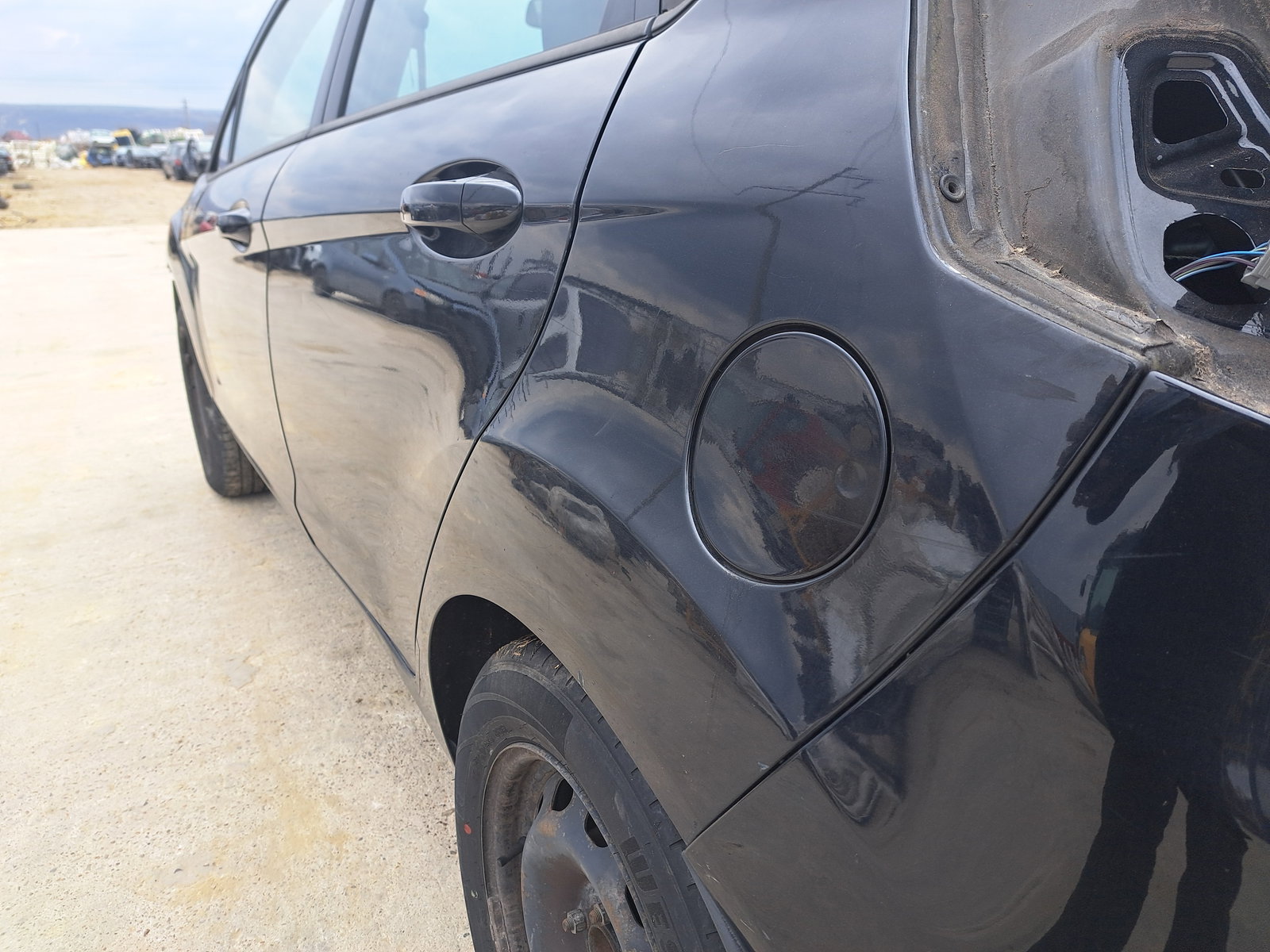 Aripa stanga spate Ford Fiesta 6 [Fabr 2008-2019] Panther Black Metal - imagine 4