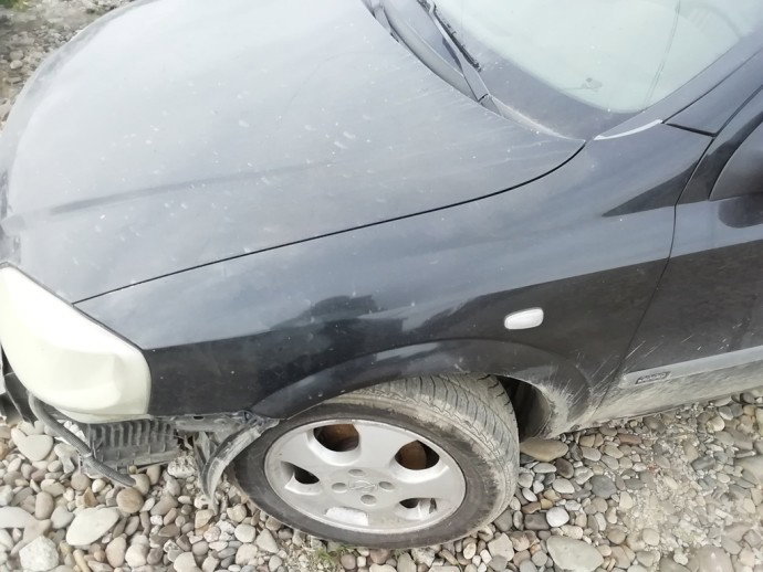 Aripa stanga fata Opel Astra G 1.6 benz OEM 1998-2004
