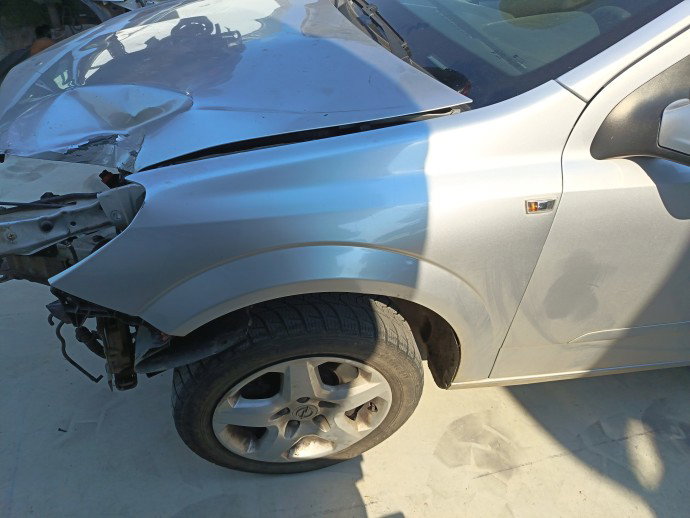 Aripa stanga fata Opel Astra H [Fabr 2004-2009] Break  195 Gri Meteor